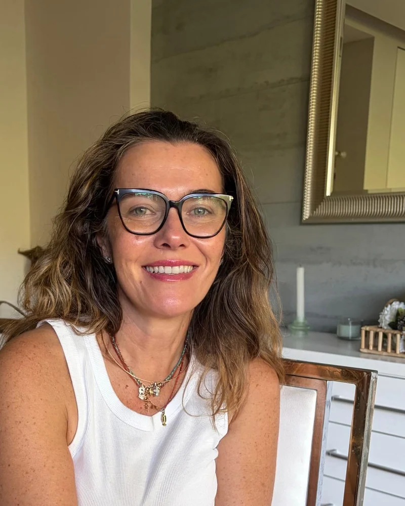 Ana Isabel smiling for a portrait